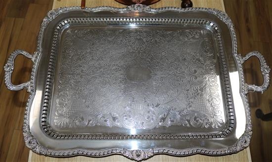 A large plated pierced two-handled tray